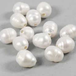 Sötvattenspärlor, Dia. 9-11 mm, Hålstl. 2 mm, Längsgående perforering, pärlemor, 13 st./ 1 förp.