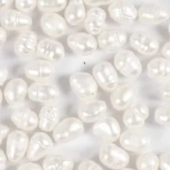 Sötvattenspärlor, Dia. 4-6 mm, Hålstl. 1 mm, Längsgående perforering, pärlemor, 55 st./ 1 förp.